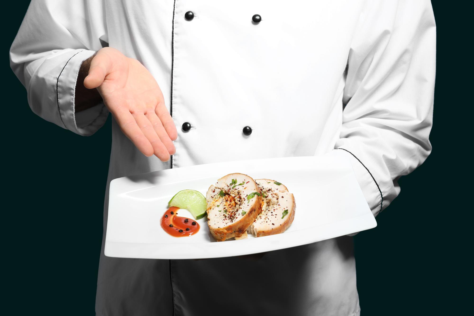 Chef preparing a modern plated dish