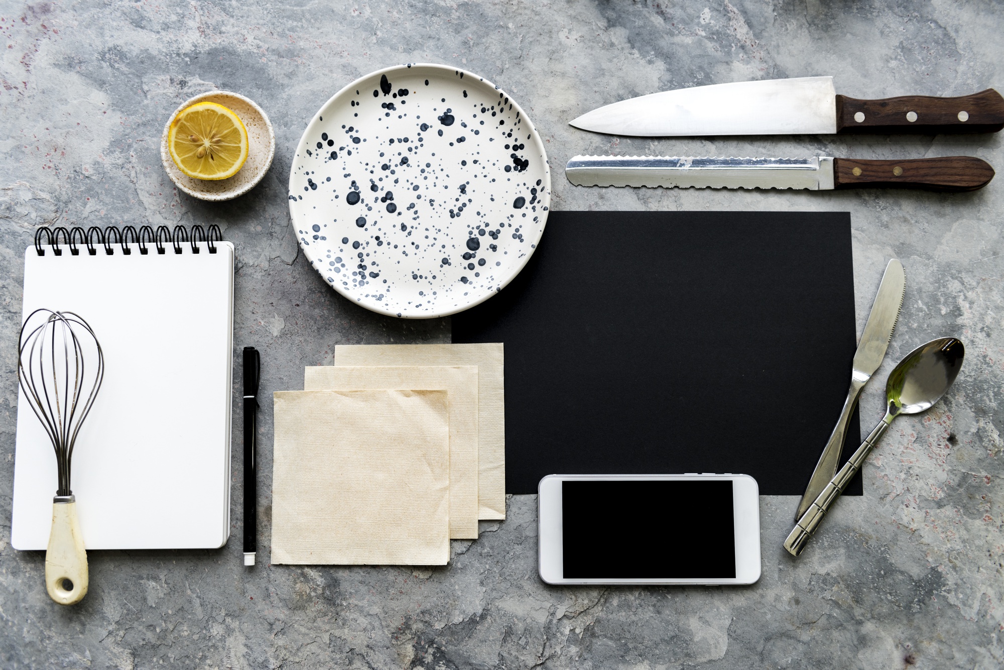Flat lay of tasting set and notebooks